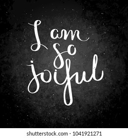 I am so joiful. Hand written calligraphy quote motivation for life and happiness on blackboard. For postcard, poster, prints, cards graphic design.