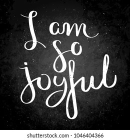 I am so joiful. Hand written calligraphy quote motivation for life and happiness on blackboard. For postcard, poster, prints, cards graphic design.