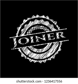 Joiner on chalkboard