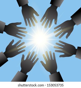 Joining hands together against blue sky. Teamwork concept. 