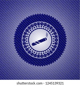 joint, cigarette icon inside badge with jean texture