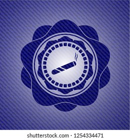 joint, cigarette icon inside badge with denim background