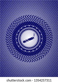  joint, cigarette icon inside badge with jean texture