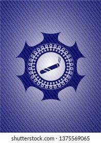 joint, cigarette icon inside badge with jean texture