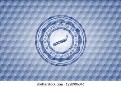 joint, cigarette icon inside blue badge with geometric pattern.