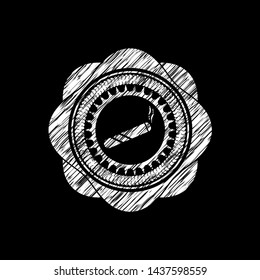 joint, cigarette icon inside chalkboard emblem on black board