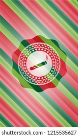 joint, cigarette icon inside christmas colors style badge.