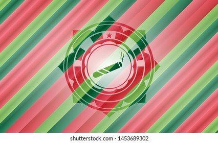 joint, cigarette icon inside christmas colors emblem.