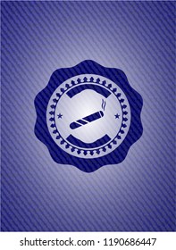 joint, cigarette icon inside denim background