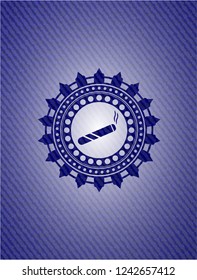 joint, cigarette icon inside emblem with denim high quality background