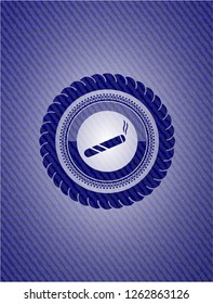 joint, cigarette icon inside emblem with jean texture