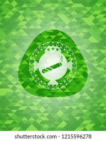 joint, cigarette icon inside green emblem. Mosaic background
