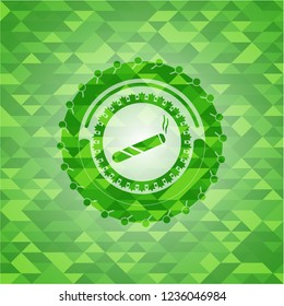 joint, cigarette icon inside green emblem. Mosaic background