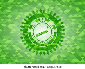 joint, cigarette icon inside green emblem with mosaic ecological style background