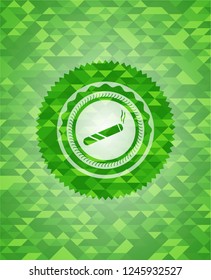 joint, cigarette icon inside green emblem with mosaic background