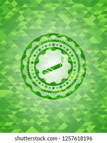 joint, cigarette icon inside green emblem with triangle mosaic background