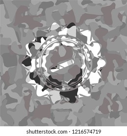 joint, cigarette icon inside grey camouflaged emblem