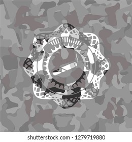 joint, cigarette icon inside grey camouflage emblem