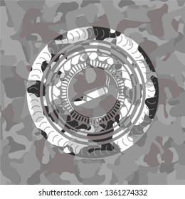 joint, cigarette icon inside grey camouflaged emblem