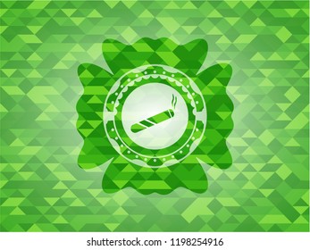 joint, cigarette icon inside realistic green emblem. Mosaic background