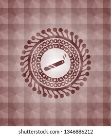 joint, cigarette icon inside red seamless emblem with geometric pattern.