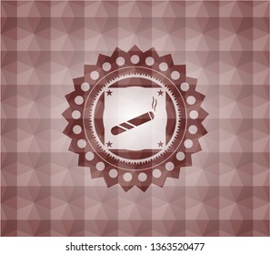 joint, cigarette icon inside red seamless emblem with geometric background.
