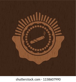 joint, cigarette icon inside retro style wooden emblem