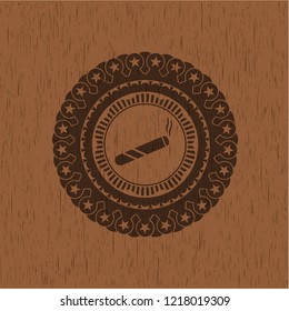joint, cigarette icon inside vintage wood emblem