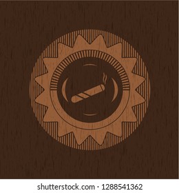 joint, cigarette icon inside vintage wooden emblem