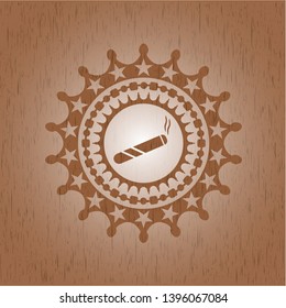 joint, cigarette icon inside vintage wooden emblem