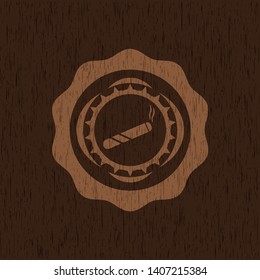 joint, cigarette icon inside vintage wooden emblem