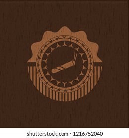 joint, cigarette icon inside wood emblem. Vintage.