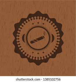 joint, cigarette icon inside wooden emblem