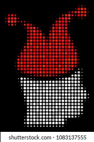 Joker halftone vector icon. Illustration style is pixel iconic joker symbol on a black background. Halftone texture is constructed from circle blots.