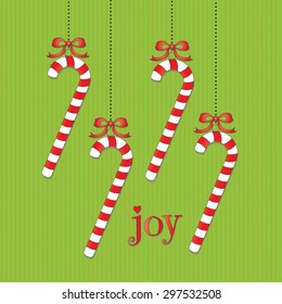 Joy Candy Cane Ornaments on Green
