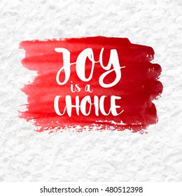 "Joy is a Choice" quote over a red watercolor brush wash. Inspirational saying. Vector EPS-10 file, transparency used. 