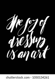 The joy of dressing is an art. Fashion asion quote. Hand lettering for your design: t-shirt, bags, posters