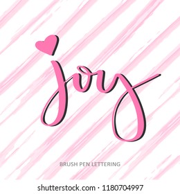 Joy - handwritten lettering word at pink abstract background.