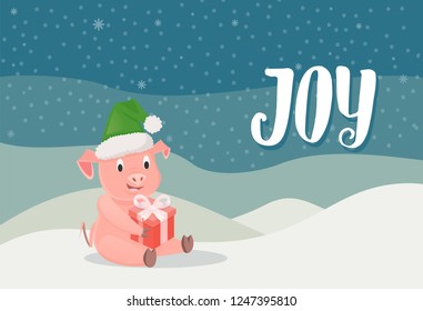 Joy, piglet symbol of New Year with gift box sitting on snow, winter landscape background. Pig in green hat wishing Merry Christmas vector postcard