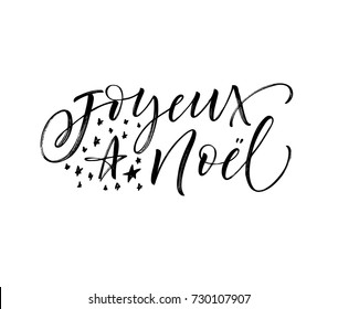 Joyeux Noel phrase. Merry Christmas in French. Greeting card. Ink illustration. Modern brush calligraphy. Isolated on white background.