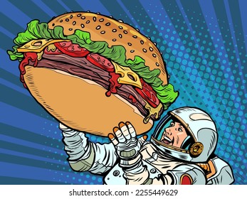Joyful astronaut man and a huge burger. Street food fast food. Hungry man Happiness positive smile pop art retro comic caricature kitsch vintage 50s 60s style