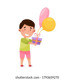 Joyful Boy Character Holding Gift Box with Balloon Vector Illustration
