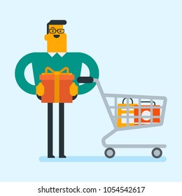 Joyful caucasian white man buying birthday gift. Man holding wrapped birthday gift box with bow while standing next to the shopping cart with shopping bags. Vector cartoon illustration. Square layout.