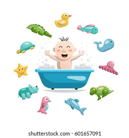 Joyful child who bathes in a bath with foam and around him is a set of animals, rubber bath toys in the bathroom.