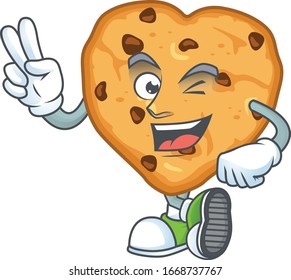 A joyful chocolate chips love mascot design showing his two fingers