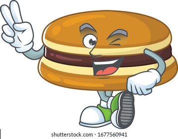 A joyful dorayaki mascot design showing his two fingers