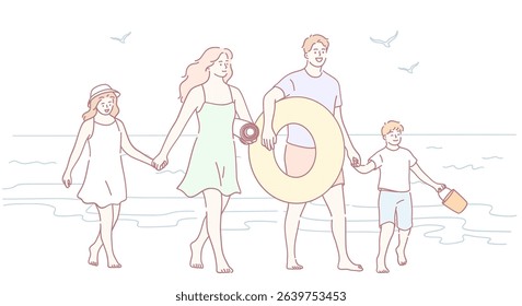 A joyful and happy family is spending a wonderful day at the beach, creating beautiful and lasting memories together