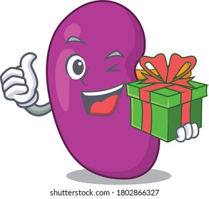 joyful kidney cartoon character with a big gift box