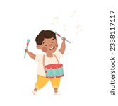 Joyful little boy playing drum. Happy kid playing toys cartoon vector illustration