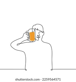 joyful man raised a mug with beer - one line drawing vector. the concept oсtorberfest, drinking with friends or colleagues, beer lover, light beer, offer or treat